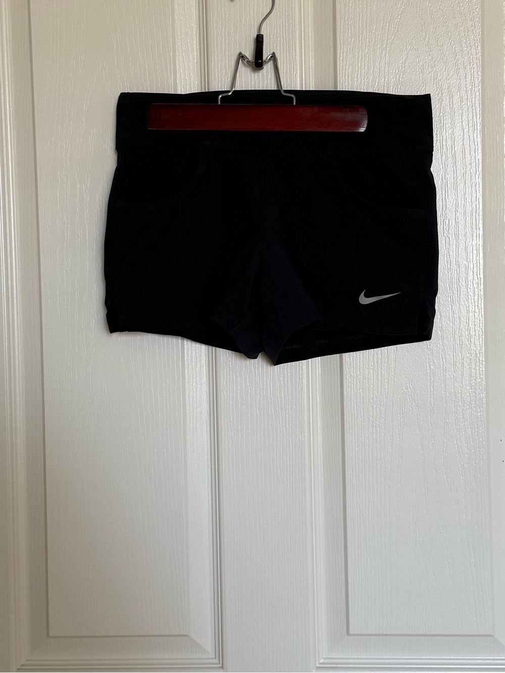 Nike : Black Athletic Shorts with Reflective Swoosh - Size S